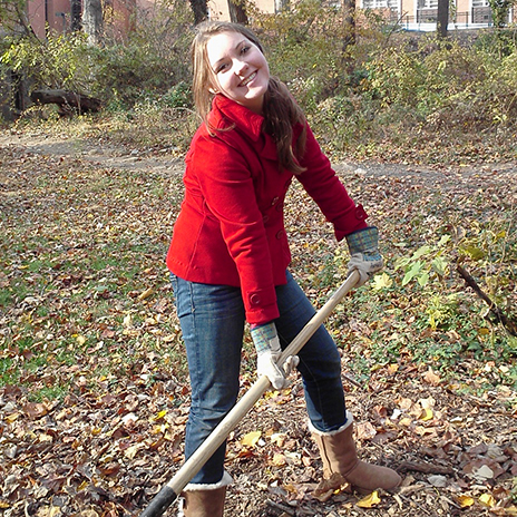 A student worker in the Glen Arboretum.