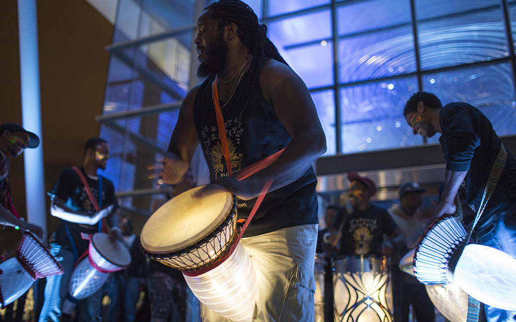 Collaborator David Fakunle performing on the kinetic light drums during Light City 2016.