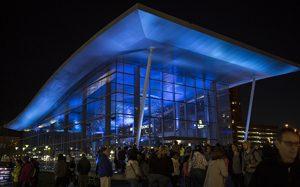 The Baltimore Visitor Center illuminated with dynamic light during Light City 2016.