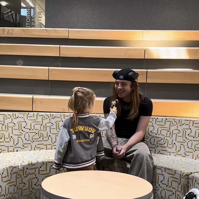 TU student and a kid