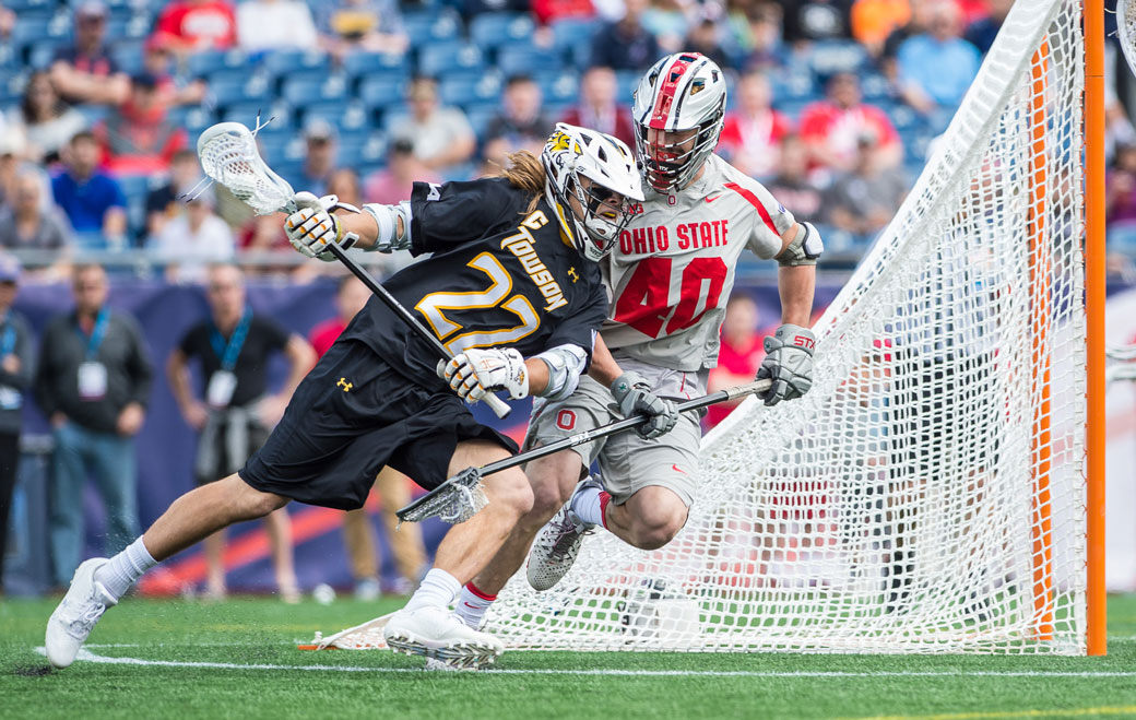 Towson University men's lacrosse player Ryan Drenner, drives to the net during the Tigers' NCAA Tournament semifinal against Ohio State. Drenner was one of several Tigers who earned United States Intercollegiate Lacrosse Association (USILA) All-American and Scholar All-American honors. He was also selected in the fourth round of the Major League Lacrosse (MLL) Draft by the Florida Launch.