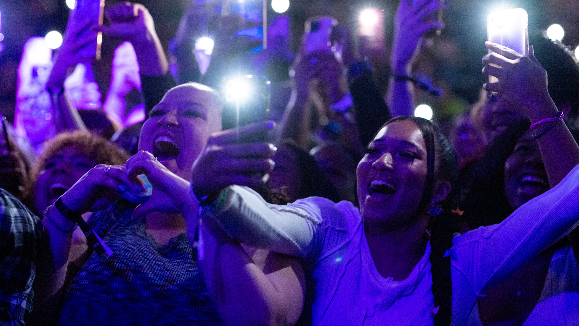 TU students in a crowd for a concert