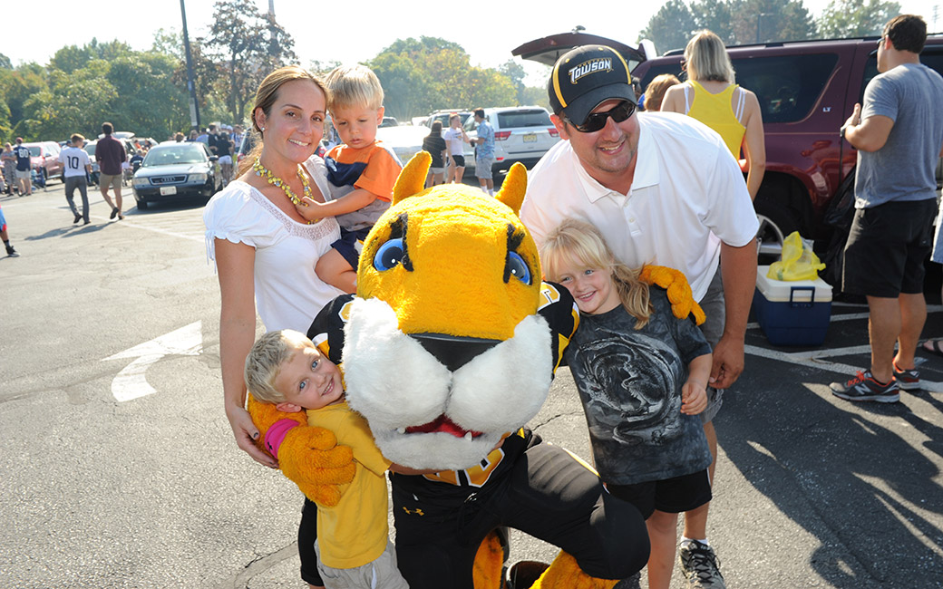 family smiling with doc the tiger