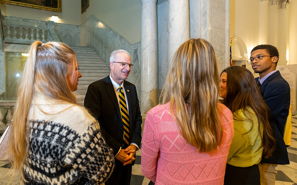 TU president Mark Ginsberg with group