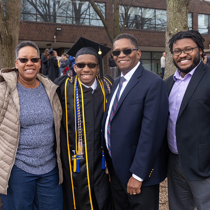 TU graduate and family