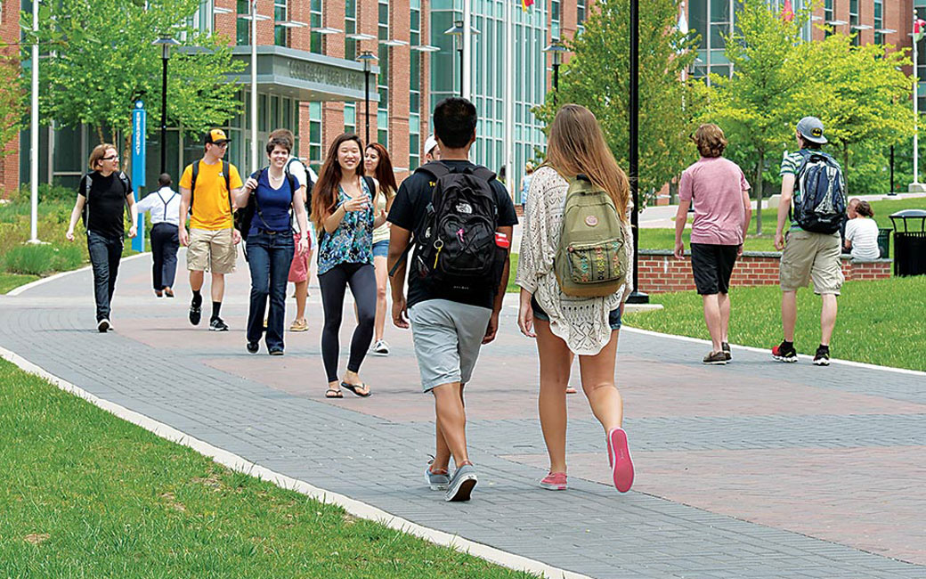 Students walking outside College of Liberal Arts building