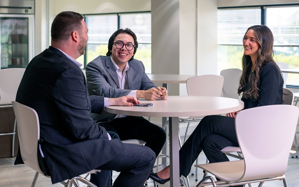 Two students talking with host at job shadowing site