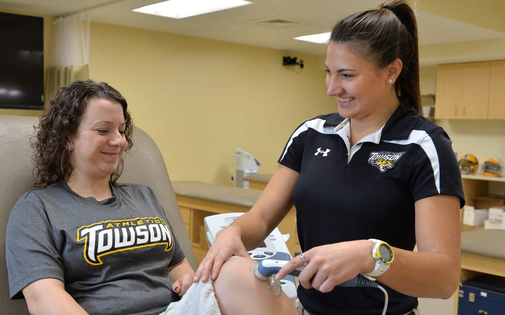 Julie Kuhlman treats an injured student