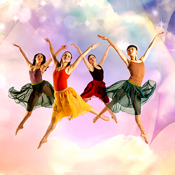 Four dancers in colorful costumes, each representing one of the seasons in nature, glide through the air in a graceful dance move