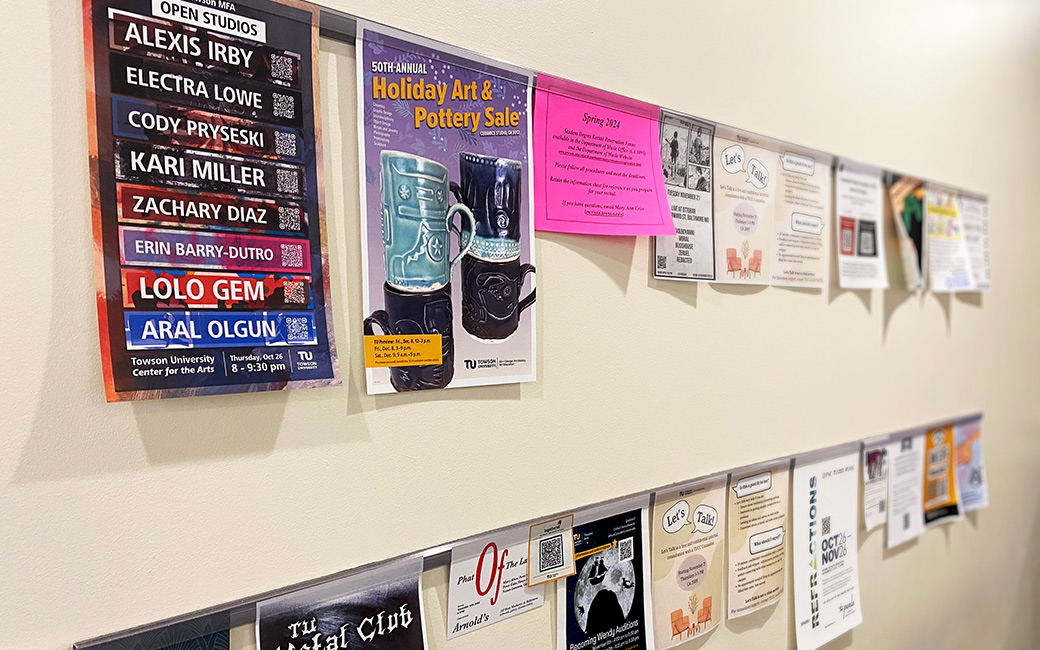 A row of hung up flyers line a CFA wall