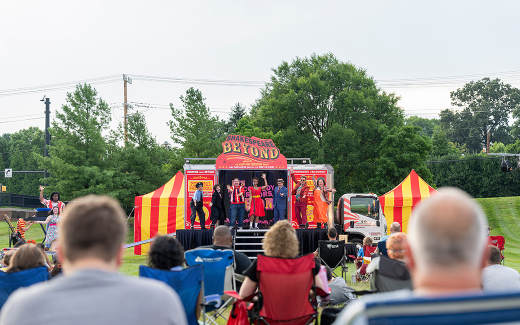 Chesapeake Shakespeare Company performing from their Shakespeare Beyond wagon on TU's lawn