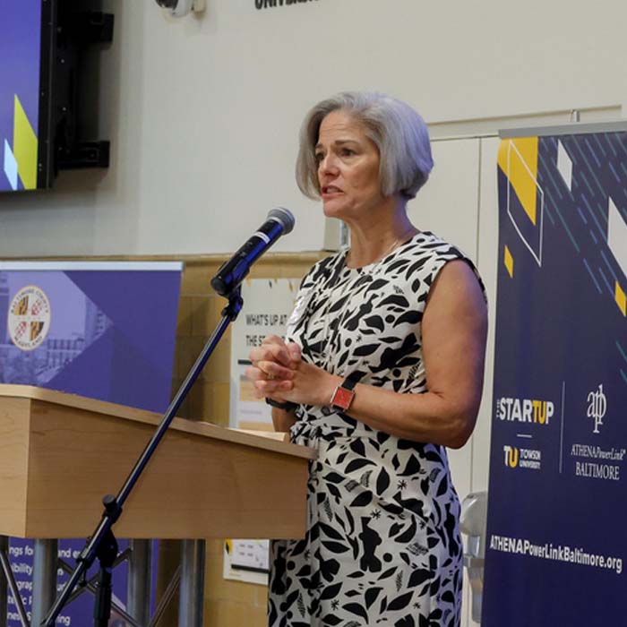 Laura Gamble speaking at an Athena event