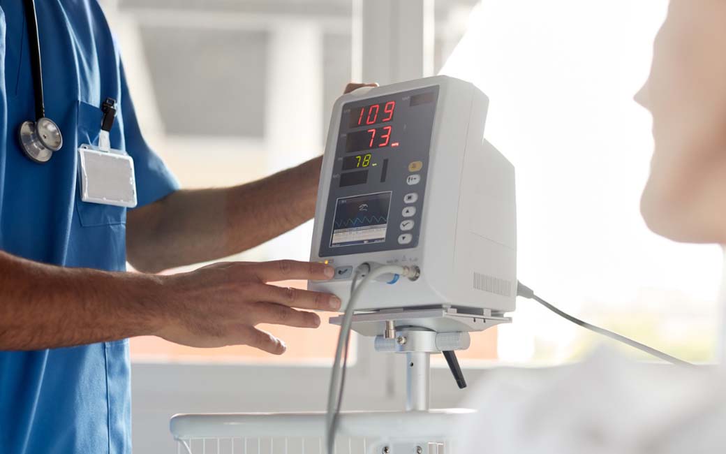 ekg machine being used in doctor's office setting