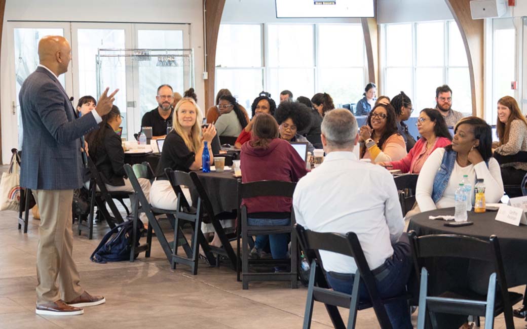 A speaker leading a workshop