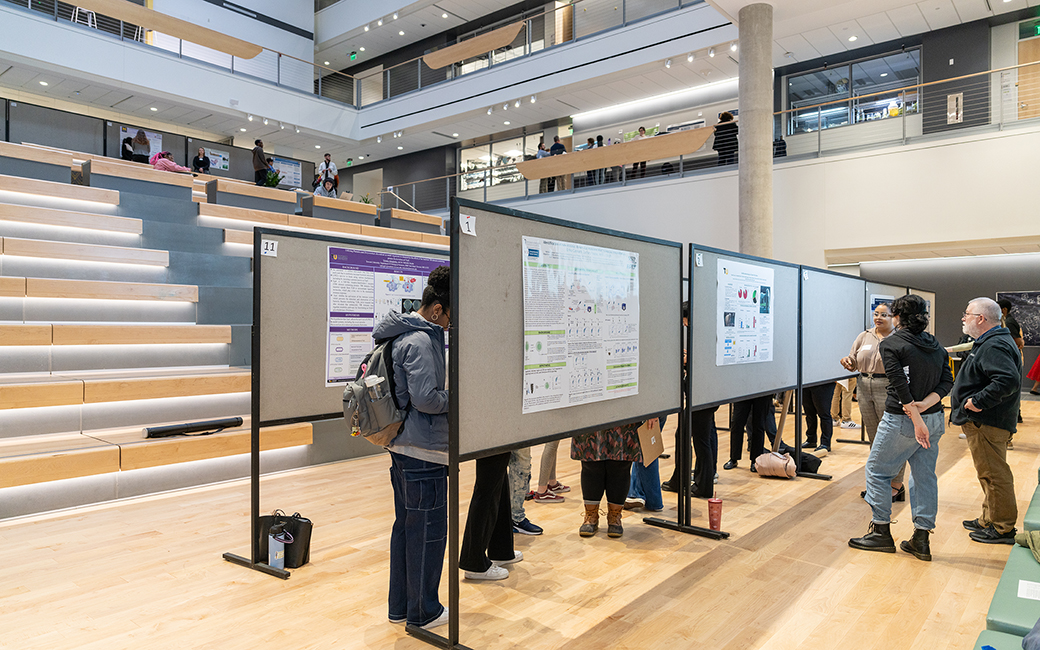 Students presenting at poster session