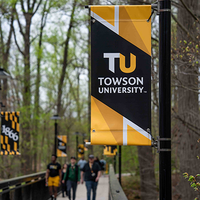 TU banner on the Glen bridge