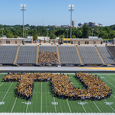 Students form a human TU