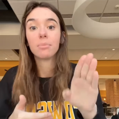 TU student using sign language