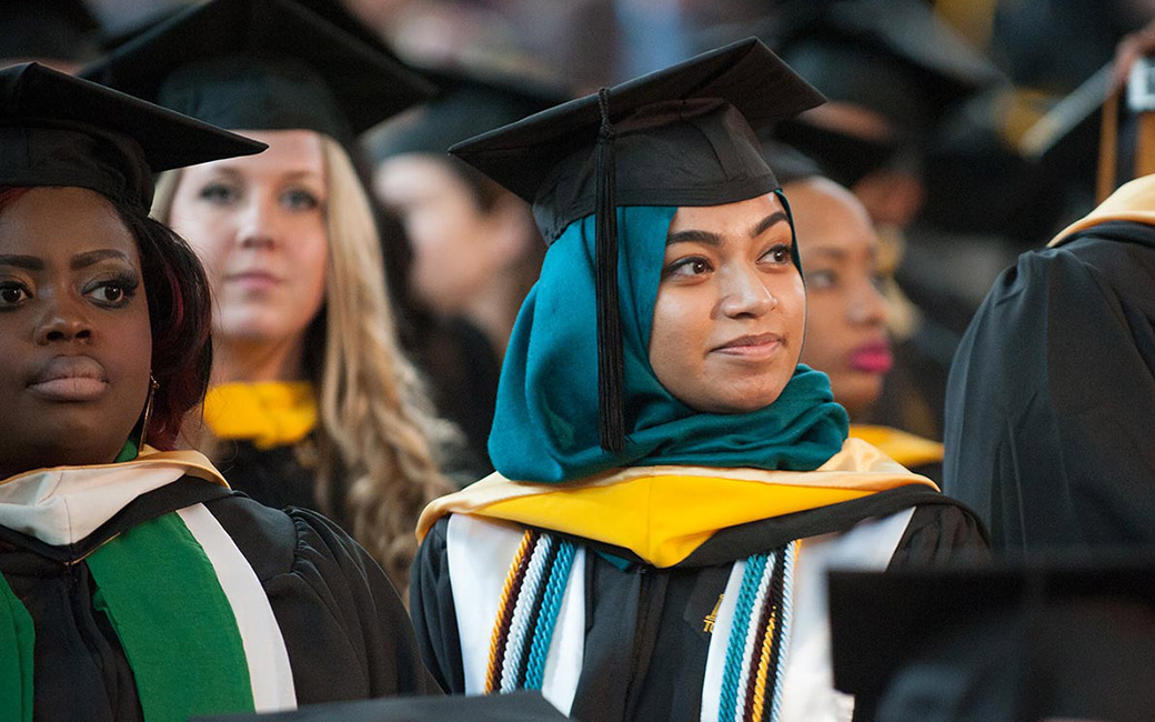 Students wearing commencement regalia