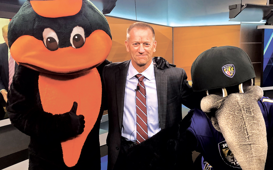 Keith Mills with the Orioles and Ravens mascots