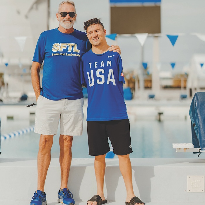 Swimmer Marty Hendrick and coach Abbas Karimi