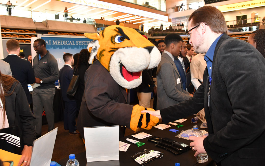 Doc The Tiger Shakes Hands at The Career Fair