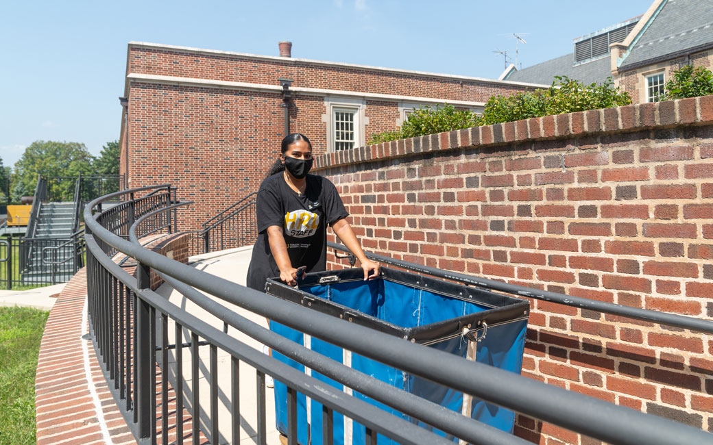 Student with a cart during move-in