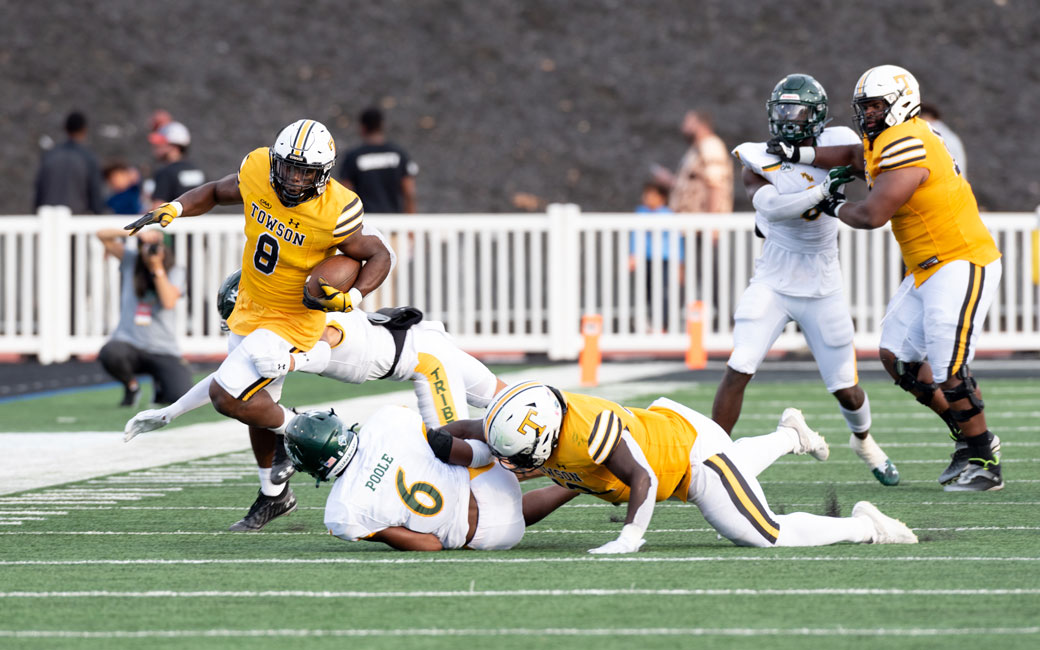 TU football player escapes a tackle