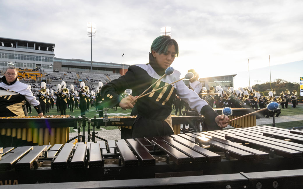 A TU Band Member plays the xylophone