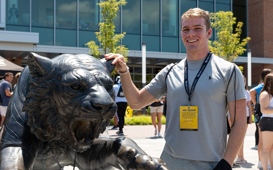 Incoming Student at the Tiger Statue near the Univerity Union