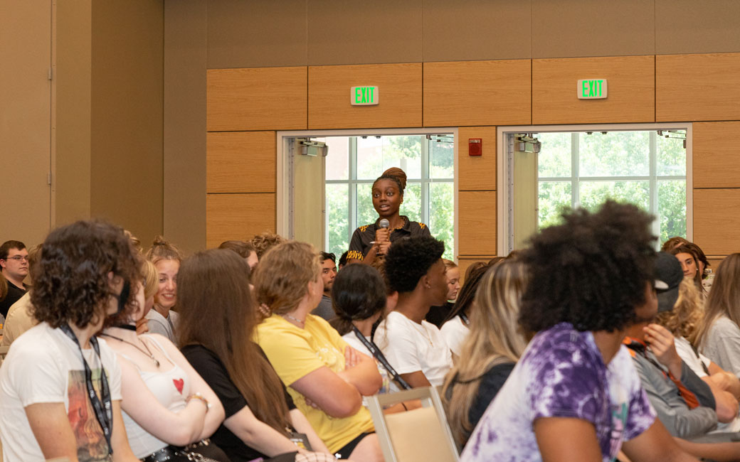 Students at an orientation presentation