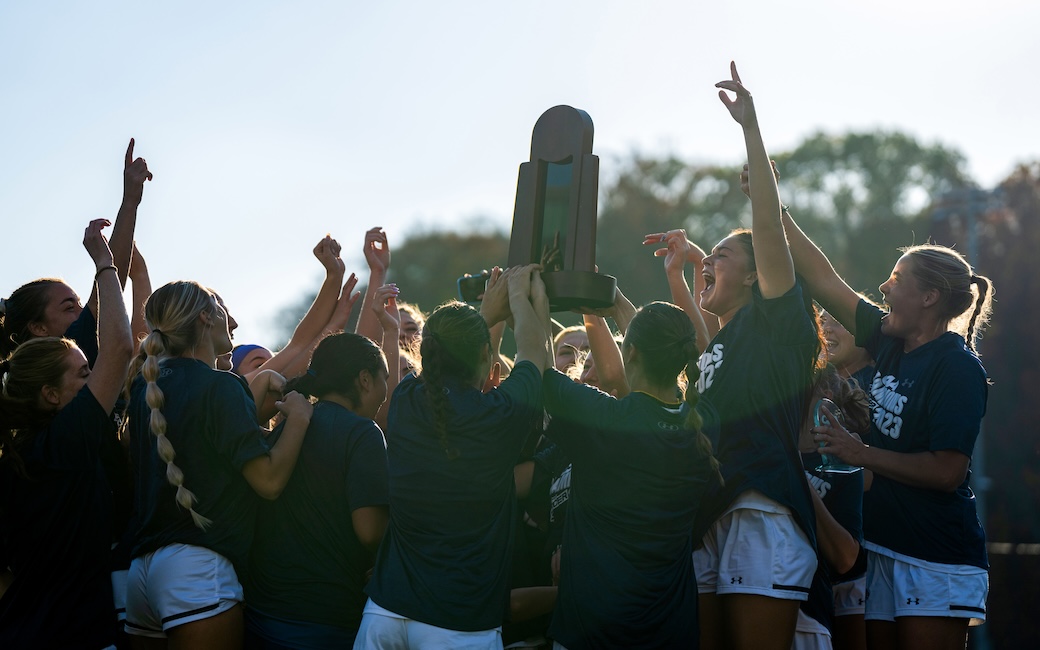 Women's soccer celebrating their first CAA championship