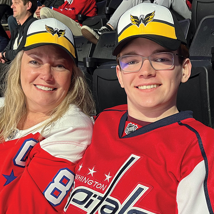 TU alum and son at a Caps game