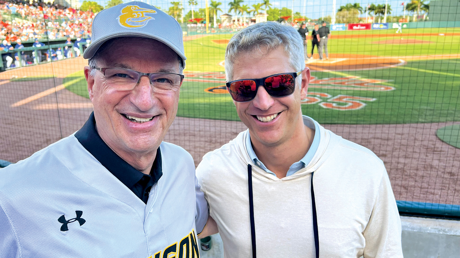 TU president Ginsberg and Oriole's General Manager Mike Elias