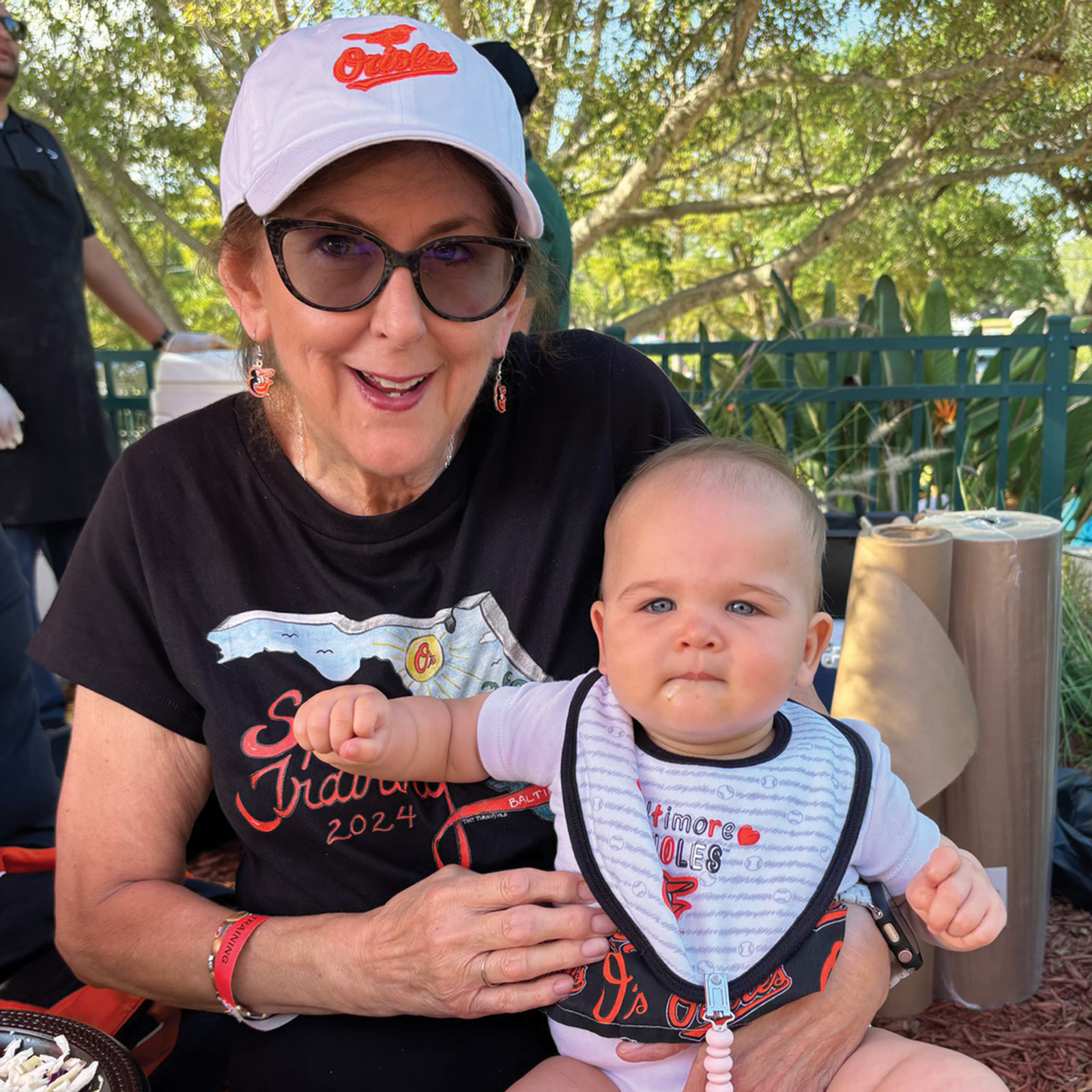 TU alum and grandbaby at the Orioles game