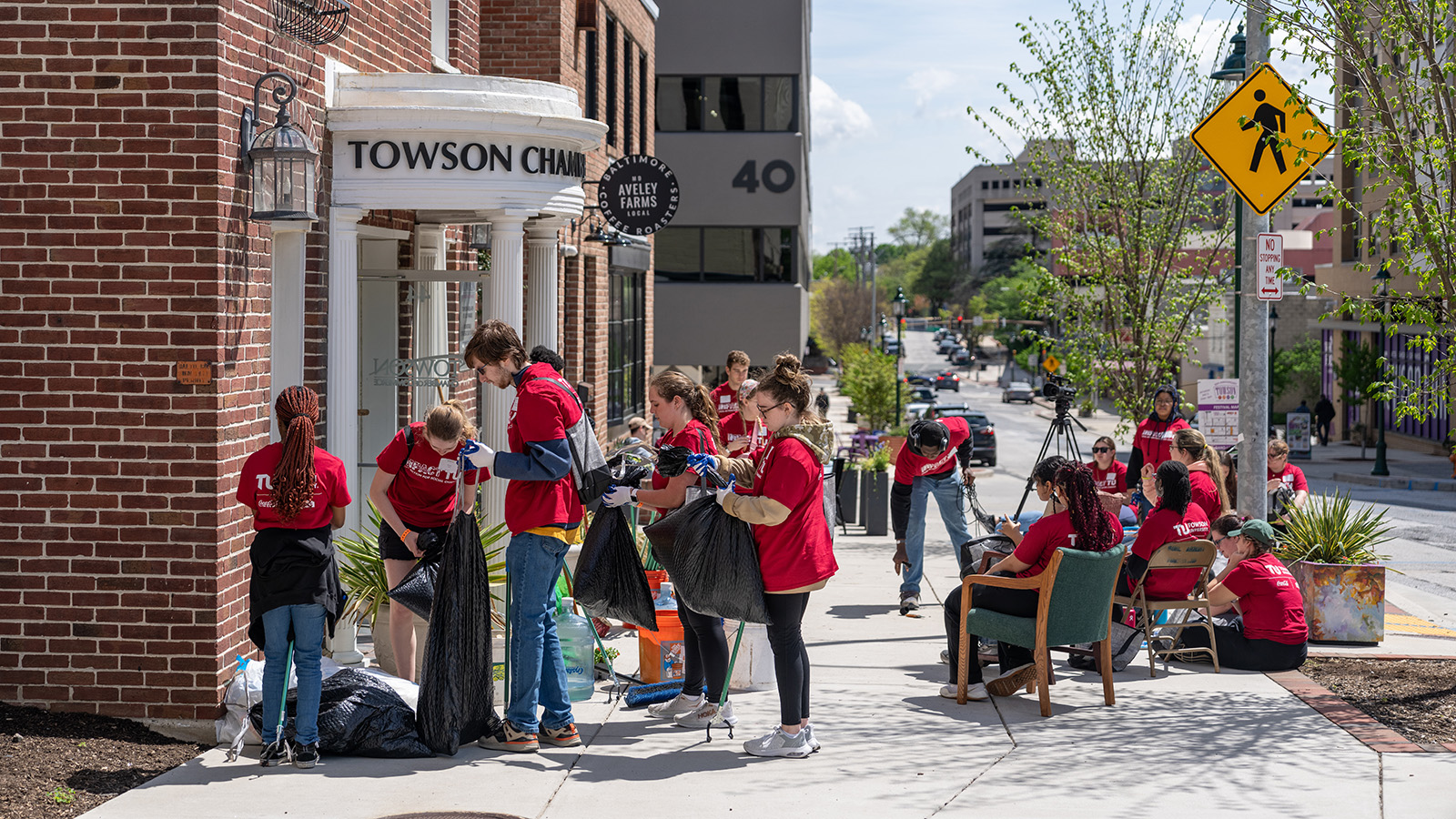 TU students cleaning up the greater Towson community during Impact TU.