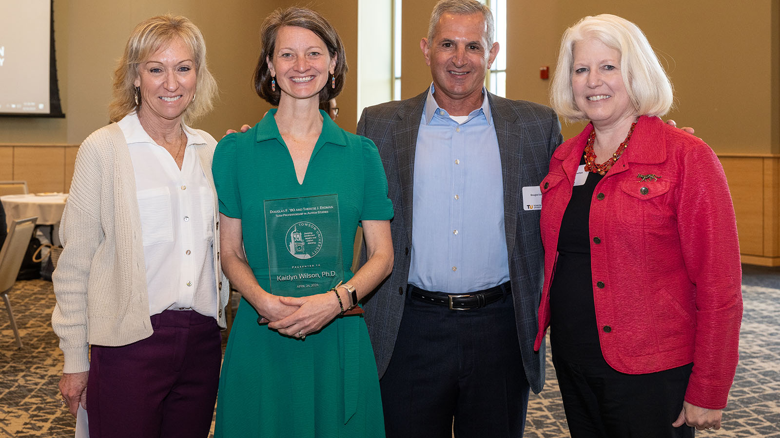 Photo from left: Therese Erdman, Kaitlyn Wilson, Ph.D., Douglas Erdman and Dean Lisa Plowfield