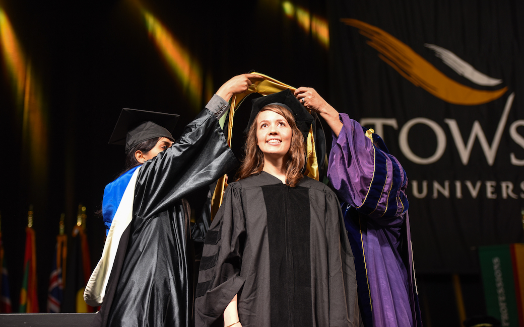 CHP doctoral student being hooded