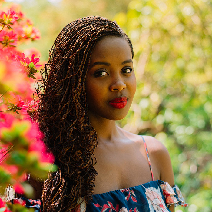 Clemantine Wamariya portrait with flowers