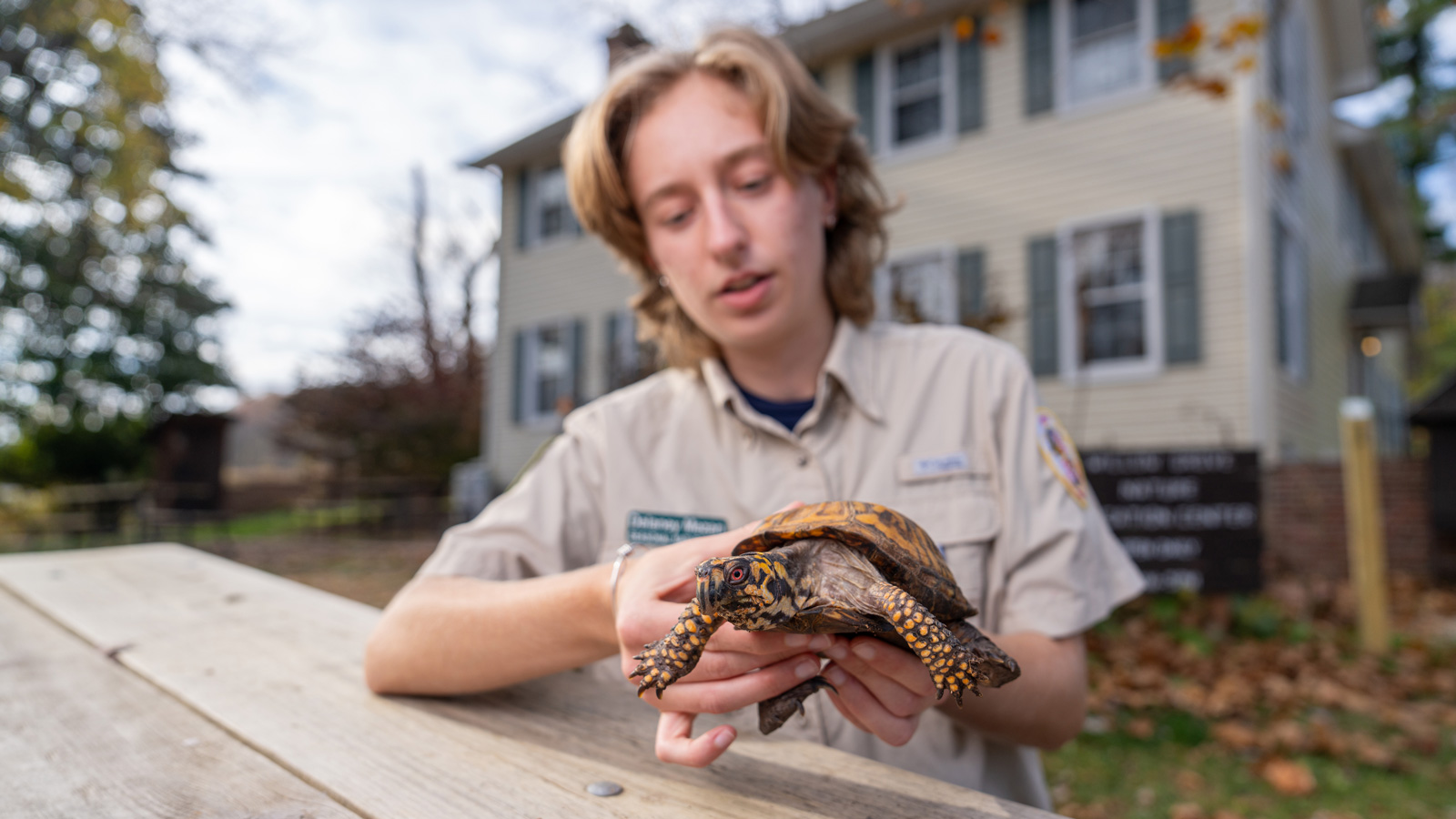 Delaney Mezan with a turtle