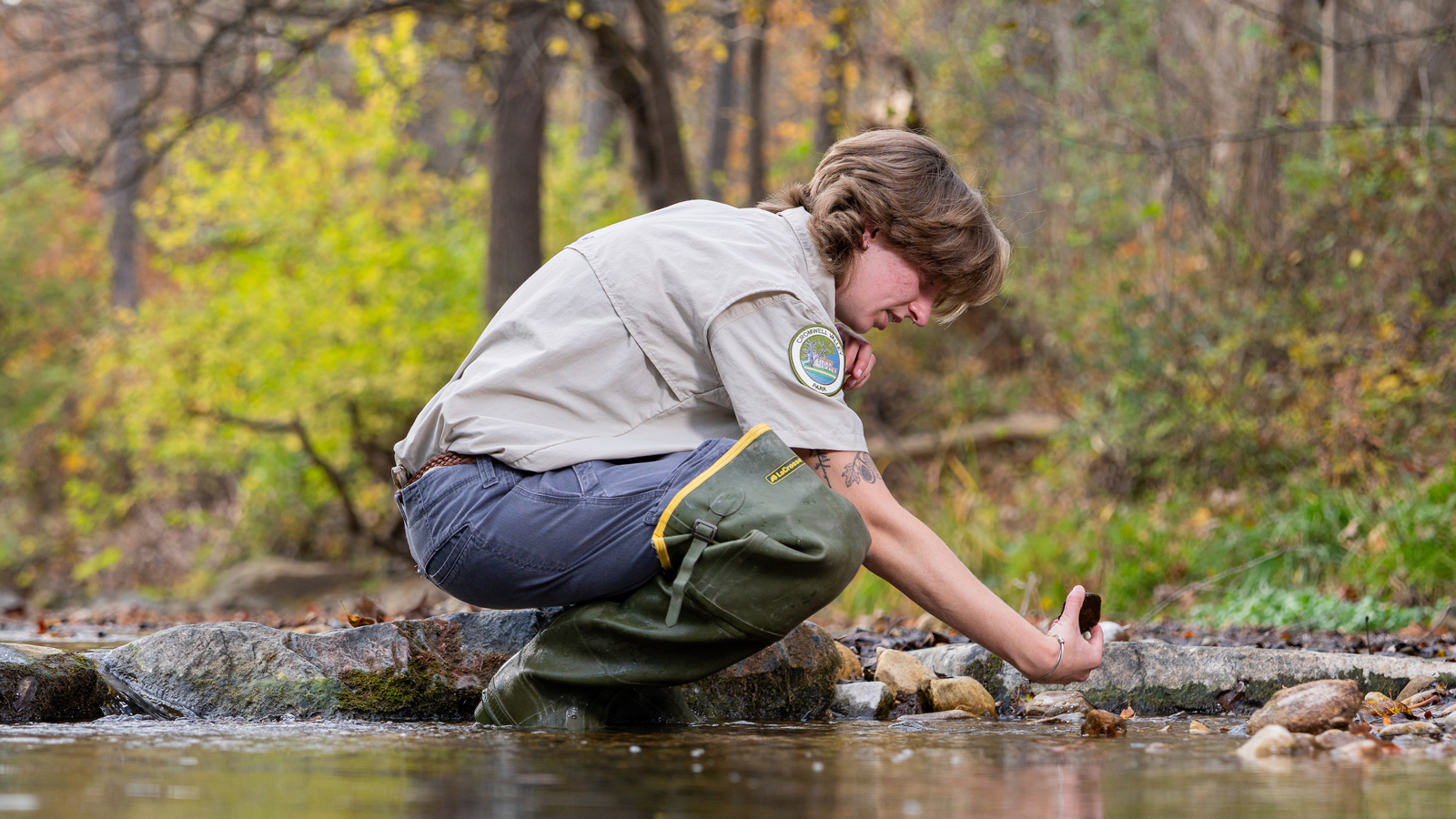 Delaney Mezan looking inspecting the water