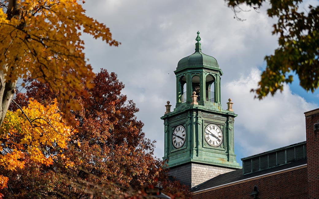 Bell tower surrounded by fall foliage