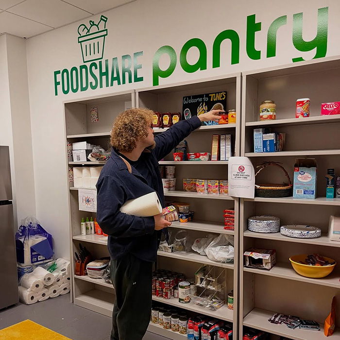 Student grabbing some food at the foodshare at TU in Northeastern Maryland