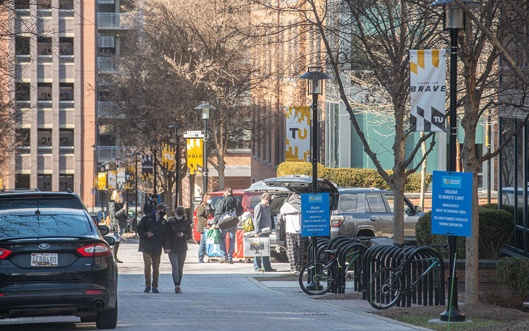 Students and families moving in from street