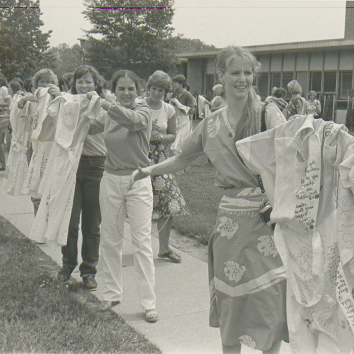 Students hanging their uniforms on Towsontown Blvd