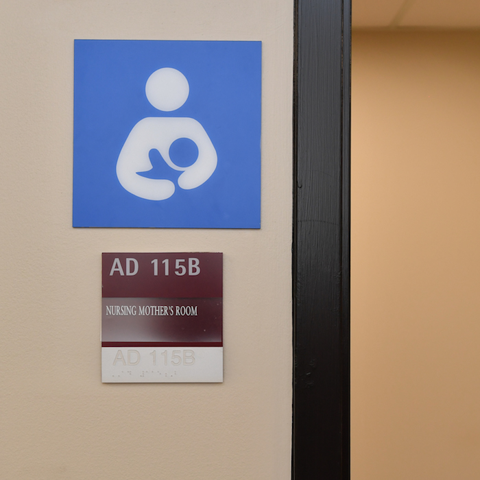 The sign for the nursing mothers' room