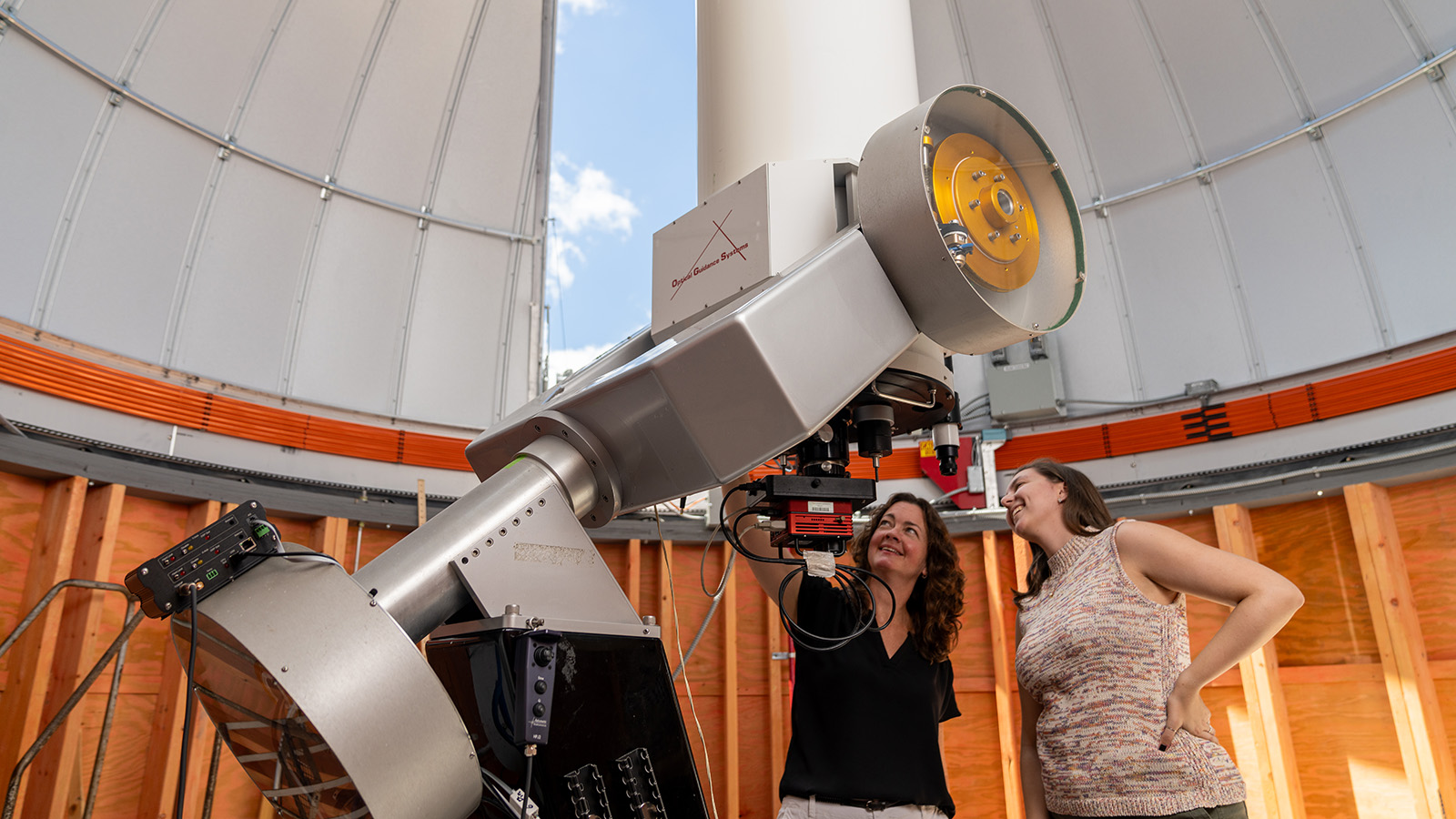 Dr. Jennifer Scott and Shannon Markward at the telescope inside the observatory