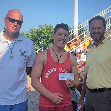 Anthony Handle receiving his scholarship award