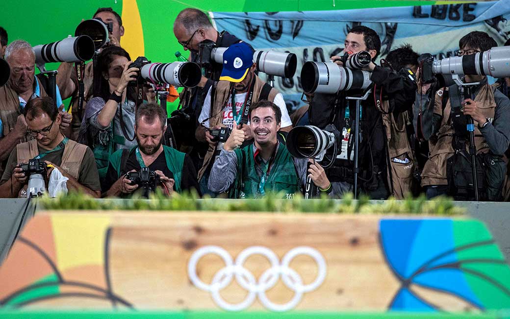 Patrick Smith '09 among the photographers in Rio