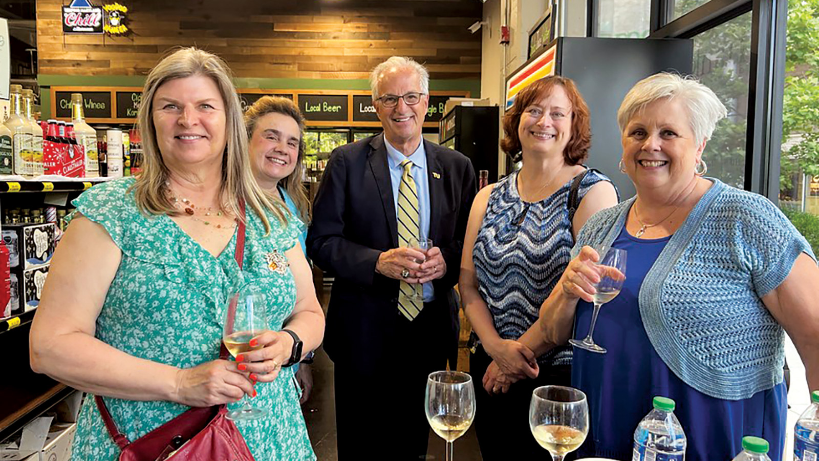 Members of the Tall-Wiedefeld Society stand together with President Mark Ginsberg